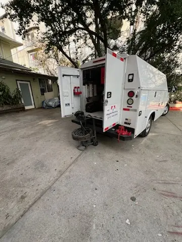 Magnet Plumbing service vehicle on-site for Grease Trap Cleaning in Diamondhead